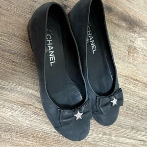 CHANEL Black Flats with Star Accent